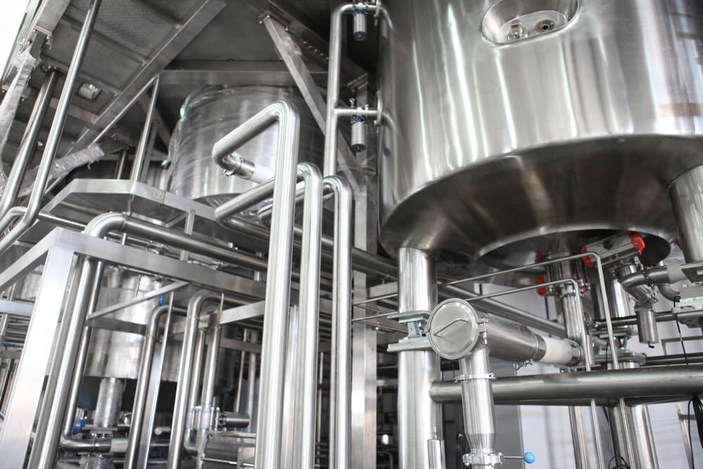 Industrial Plant for the Integrated Management of Ferrous and Non-ferrous Materials with Secondary Energy Reservoir
